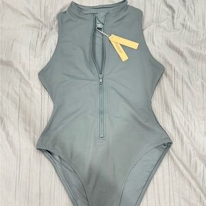 Skims front zip one piece sleeveless bathing suit